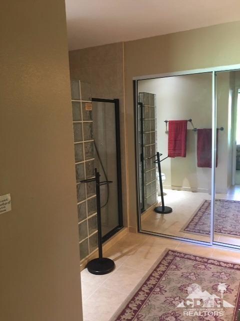 63 Torremolinos Drive Rancho Mirage, CA 92270 - Photo 10 of 32 a view of a livingroom with wooden floor and entryway