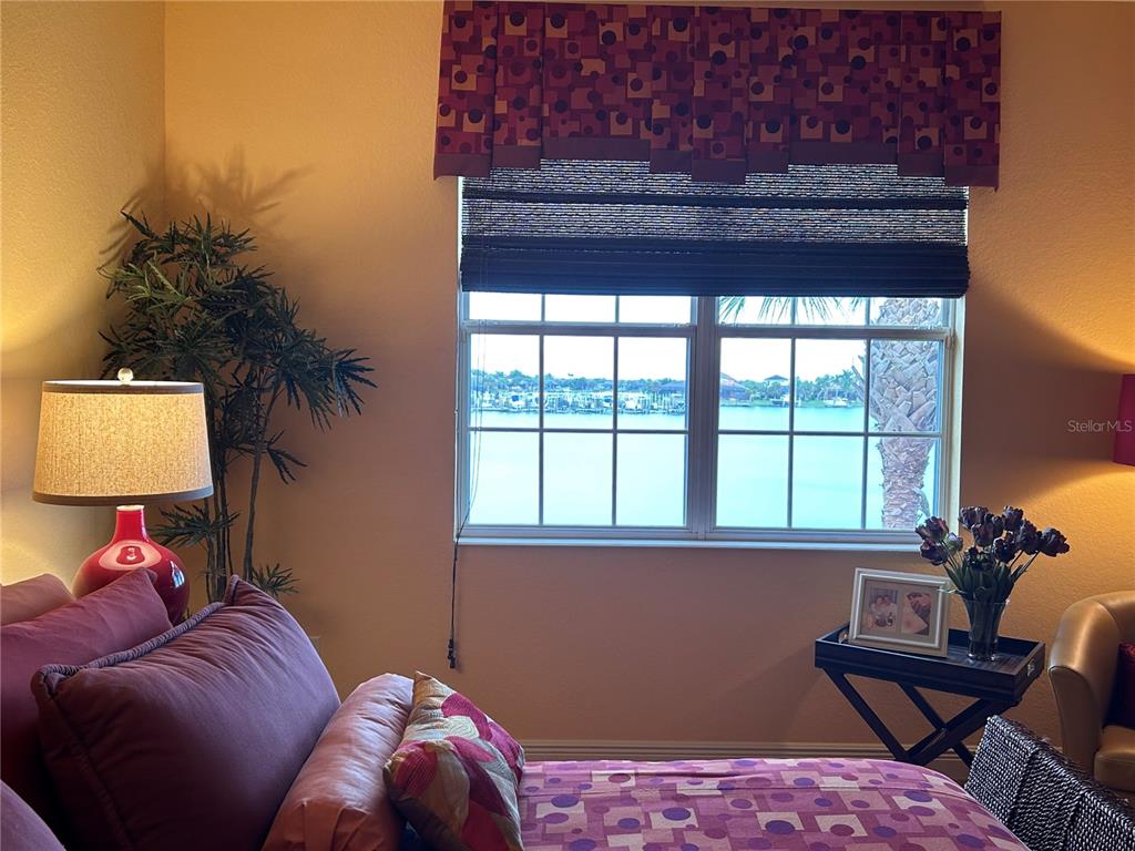 1139 Riverscape Street, Unit 1139 Bradenton, FL 34208 - Photo 22 of 45 a living room with furniture and a window