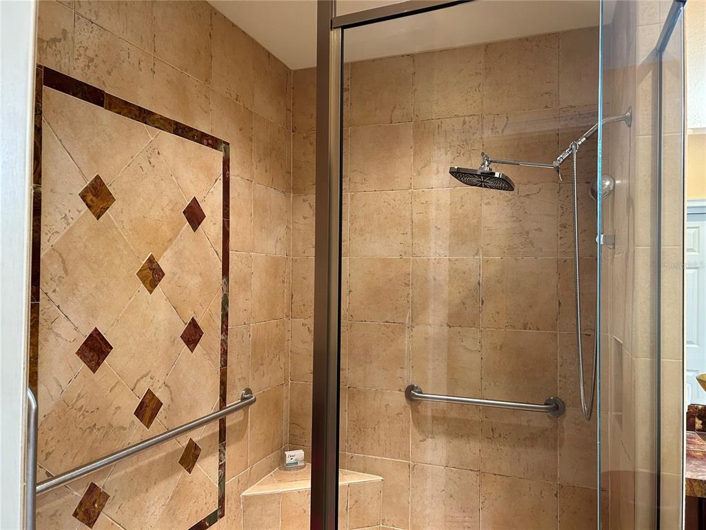1139 Riverscape Street, Unit 1139 Bradenton, FL 34208 - Photo 26 of 45 a bathroom with a shower