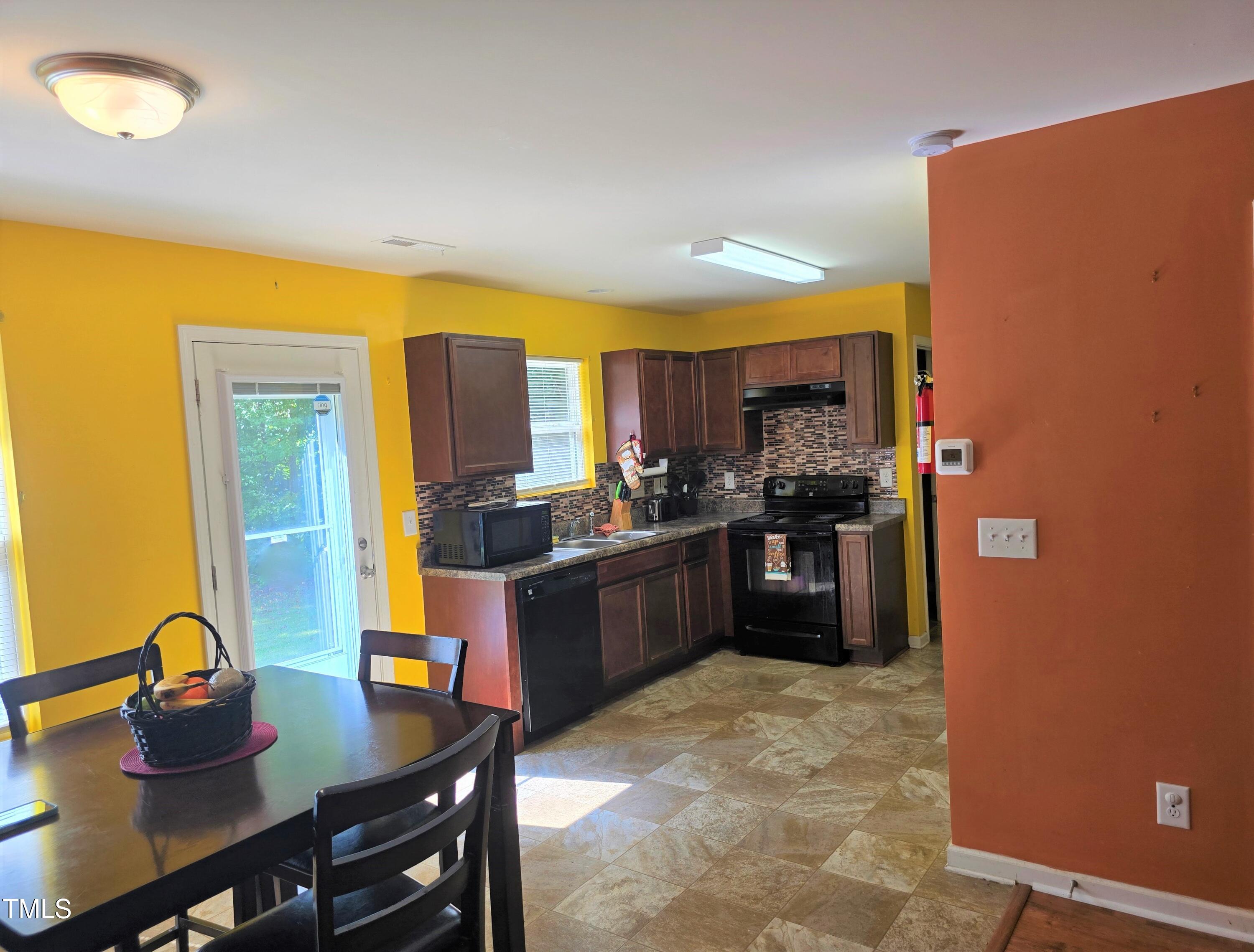 597 Gold Valley Road Spring Hope, NC 27882 - Photo 9 of 31 kitchen from dining room