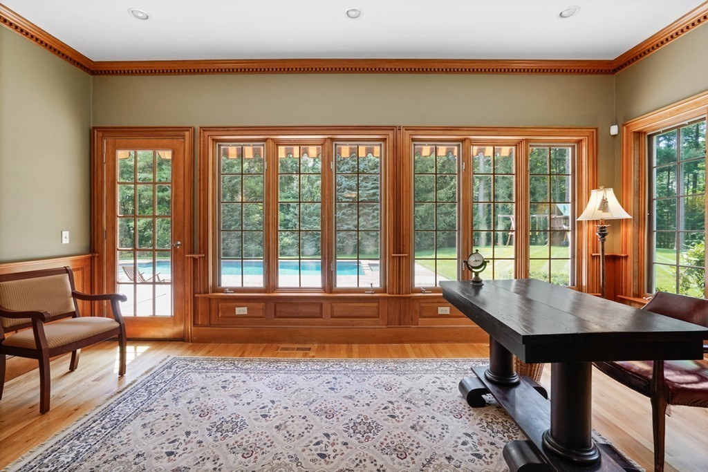 219 B Ipswich Road Boxford, MA 01921 - Photo 11 of 30 a living room filled with furniture and a window