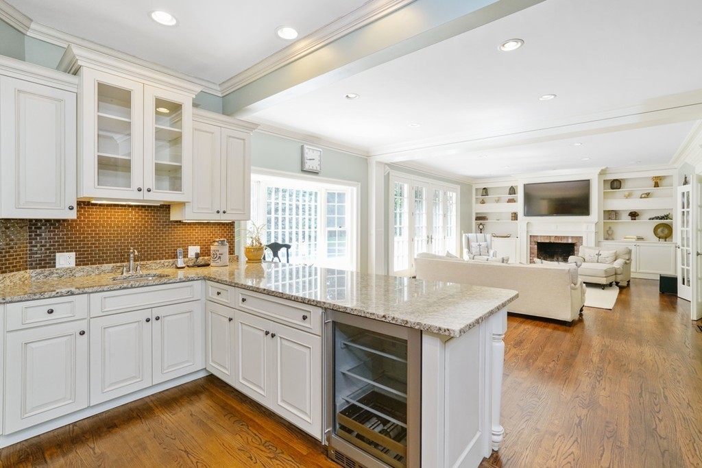 219 B Ipswich Road Boxford, MA 01921 - Photo 18 of 30 a kitchen with sink cabinets and wooden floor