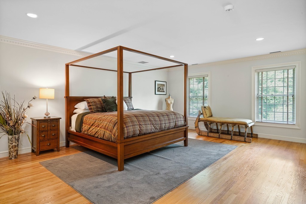 219 B Ipswich Road Boxford, MA 01921 - Photo 19 of 30 a bedroom with a bed and a window