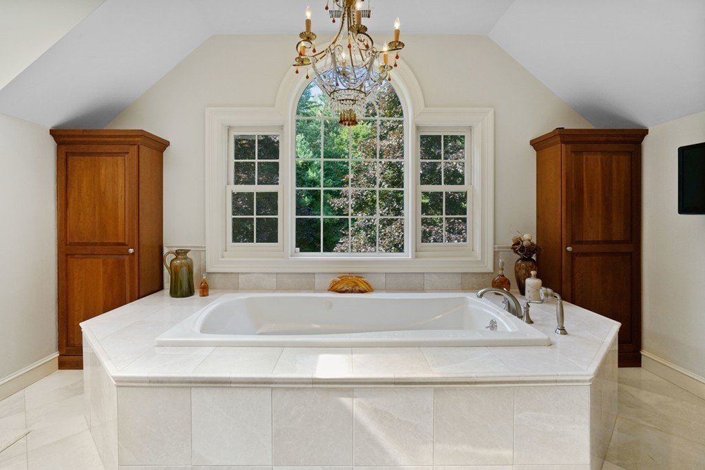 219 B Ipswich Road Boxford, MA 01921 - Photo 21 of 30 a bathroom with a granite countertop sink and a bathtub