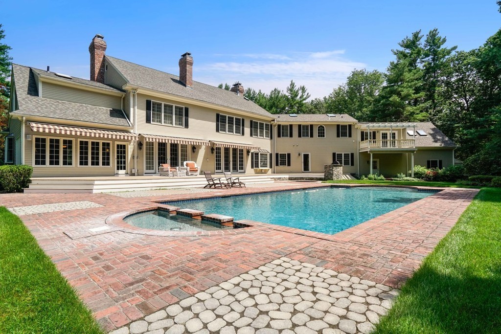 219 B Ipswich Road Boxford, MA 01921 - Photo 4 of 30 a front view of a house with swimming pool and porch