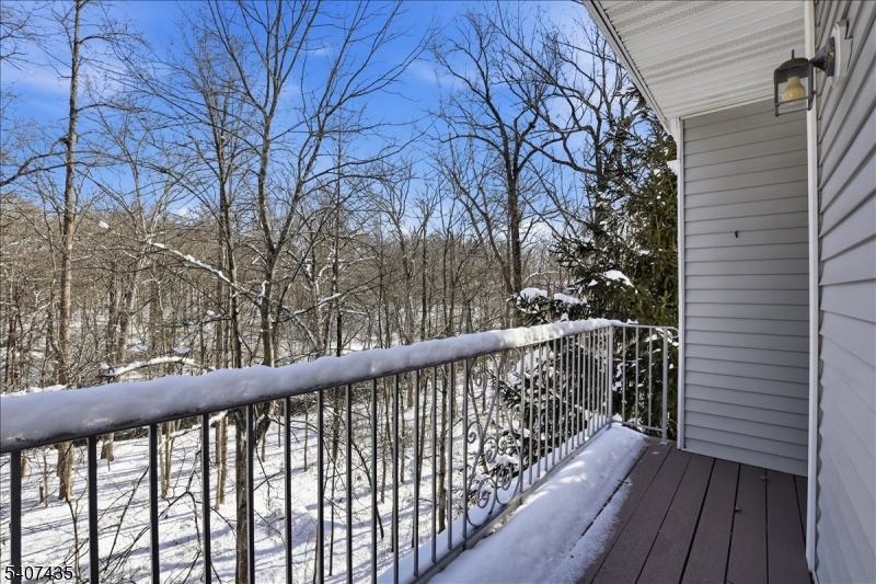 139 Riveredge Drive, Unit 139 Chatham, NJ 07928 - Photo 24 of 32 a view of balcony with wooden floor