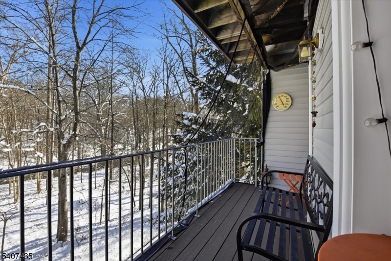 139 Riveredge Drive, Unit 139 Chatham, NJ 07928 - Photo 25 of 32 a view of balcony with wooden floor