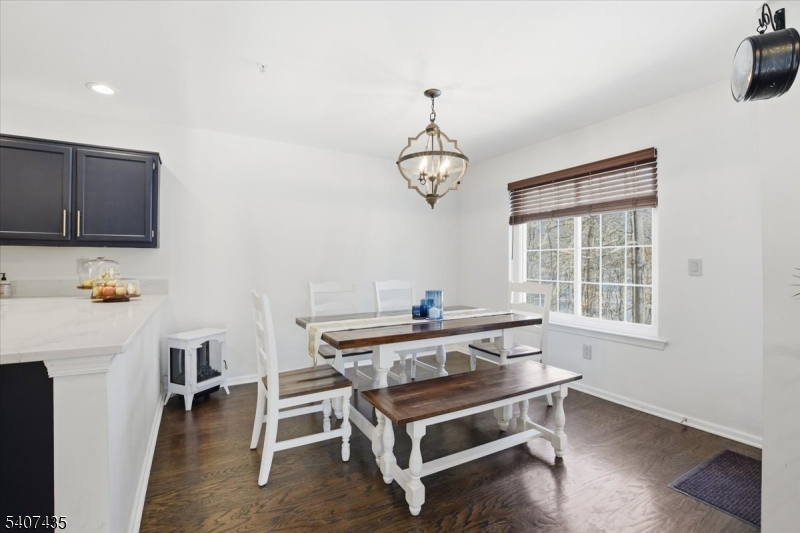139 Riveredge Drive, Unit 139 Chatham, NJ 07928 - Photo 10 of 32 a view of a workspace with furniture and a window