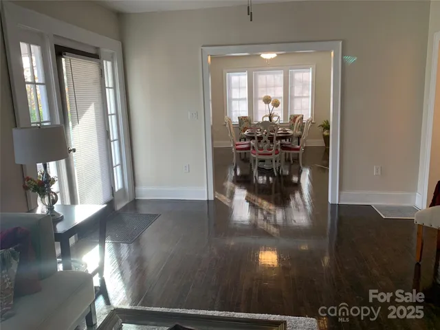 a view of dining room with wooden floor