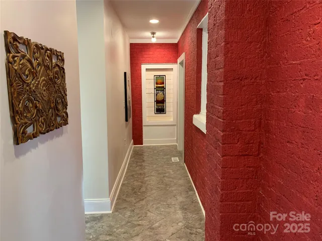 a view of hallway with stairs