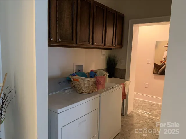 a view of hallway with livingroom