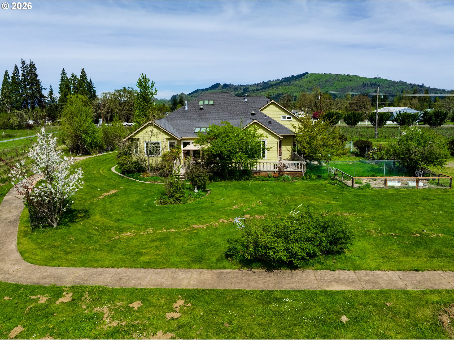 34386 Mathews Road Eugene, OR 97405 - Photo 9 of 48 an aerial view of residential houses with outdoor space and trees