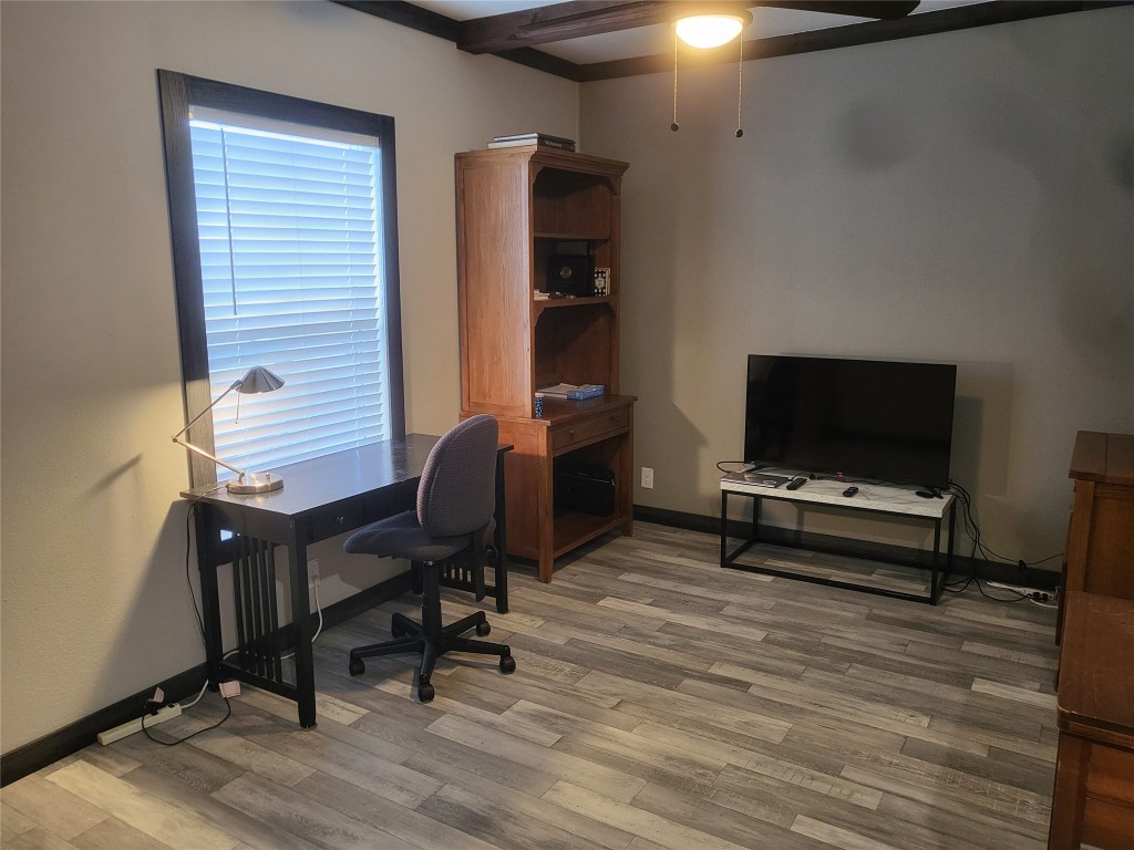 192 Lazy River Lane Elgin, TX 78621 - Photo 12 of 12 Office space featuring light wood-style flooring, beamed ceiling, and a ceiling fan