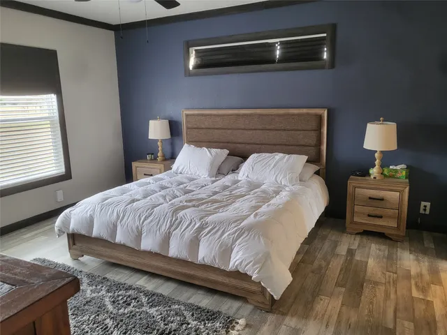 a bedroom with a bed and a closet