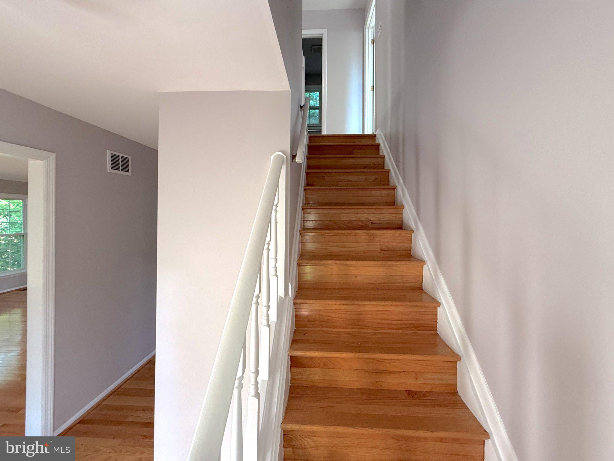 9006 Sidehill Road Ellicott City, MD 21042 - Photo 37 of 53 Inviting staircase to serene spaces.