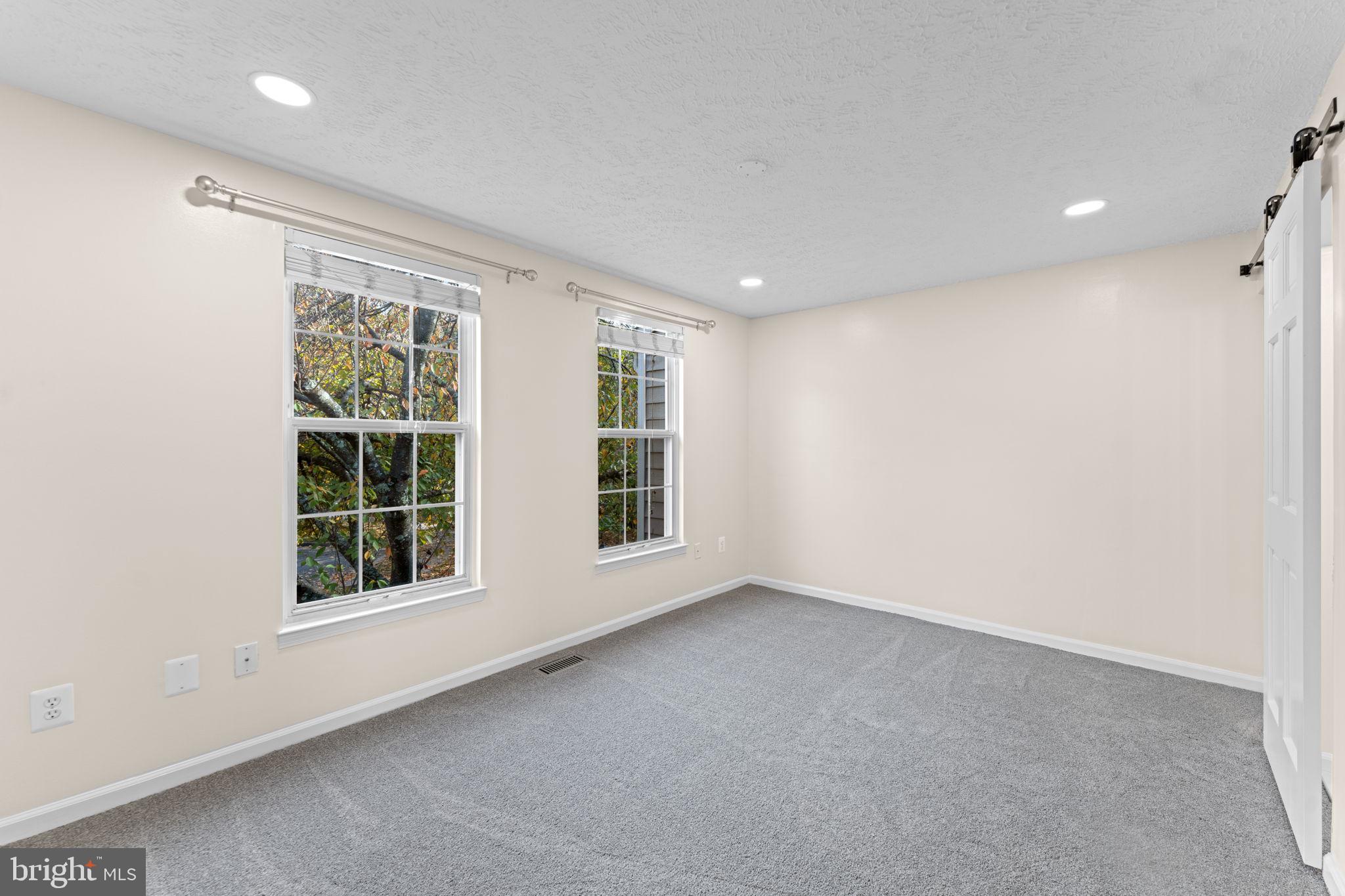 1644 Fieldthorn Drive Reston, VA 20194 - Photo 23 of 43 an empty room with windows