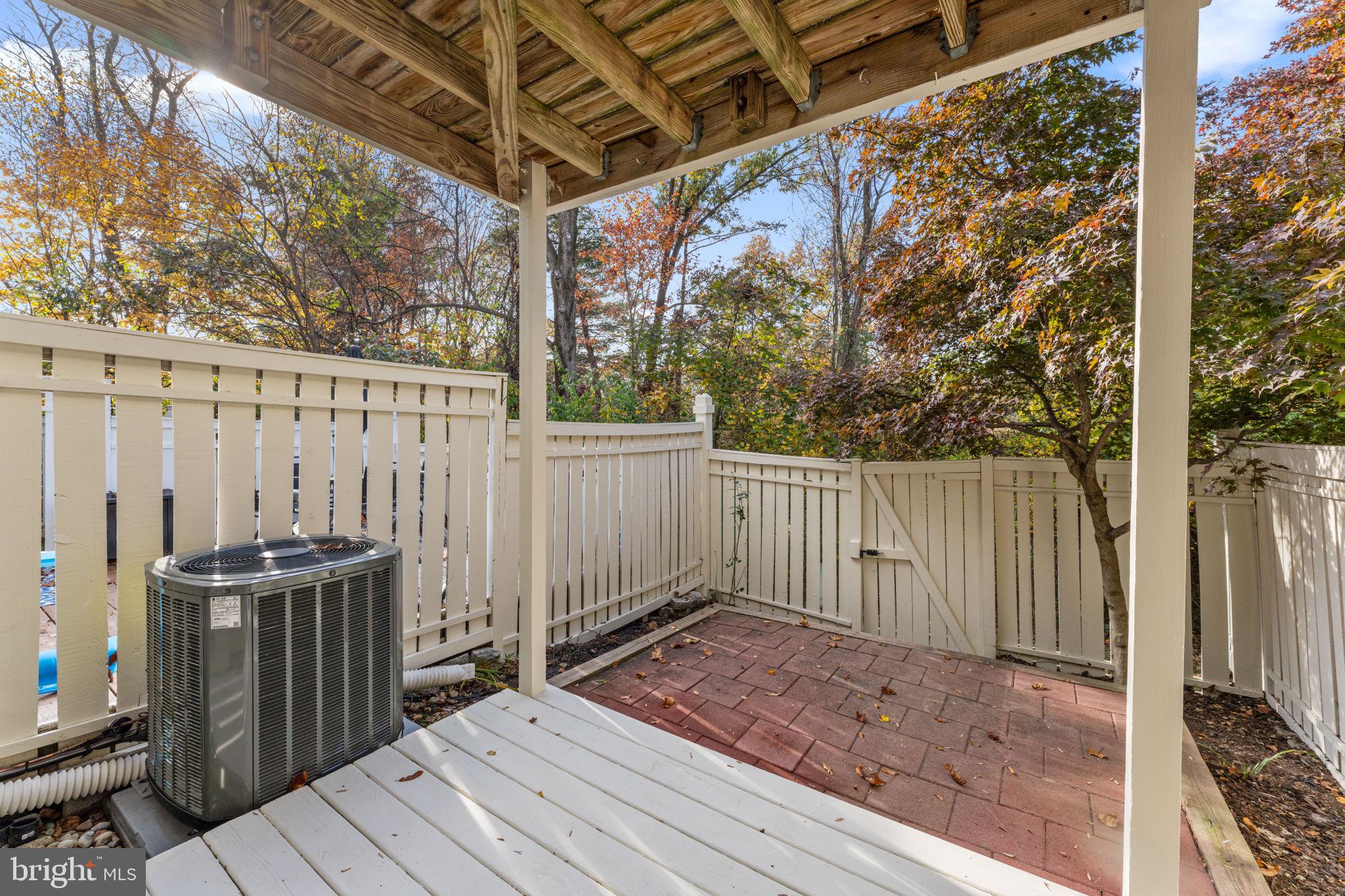 1644 Fieldthorn Drive Reston, VA 20194 - Photo 31 of 43 a view of a backyard with wooden fence