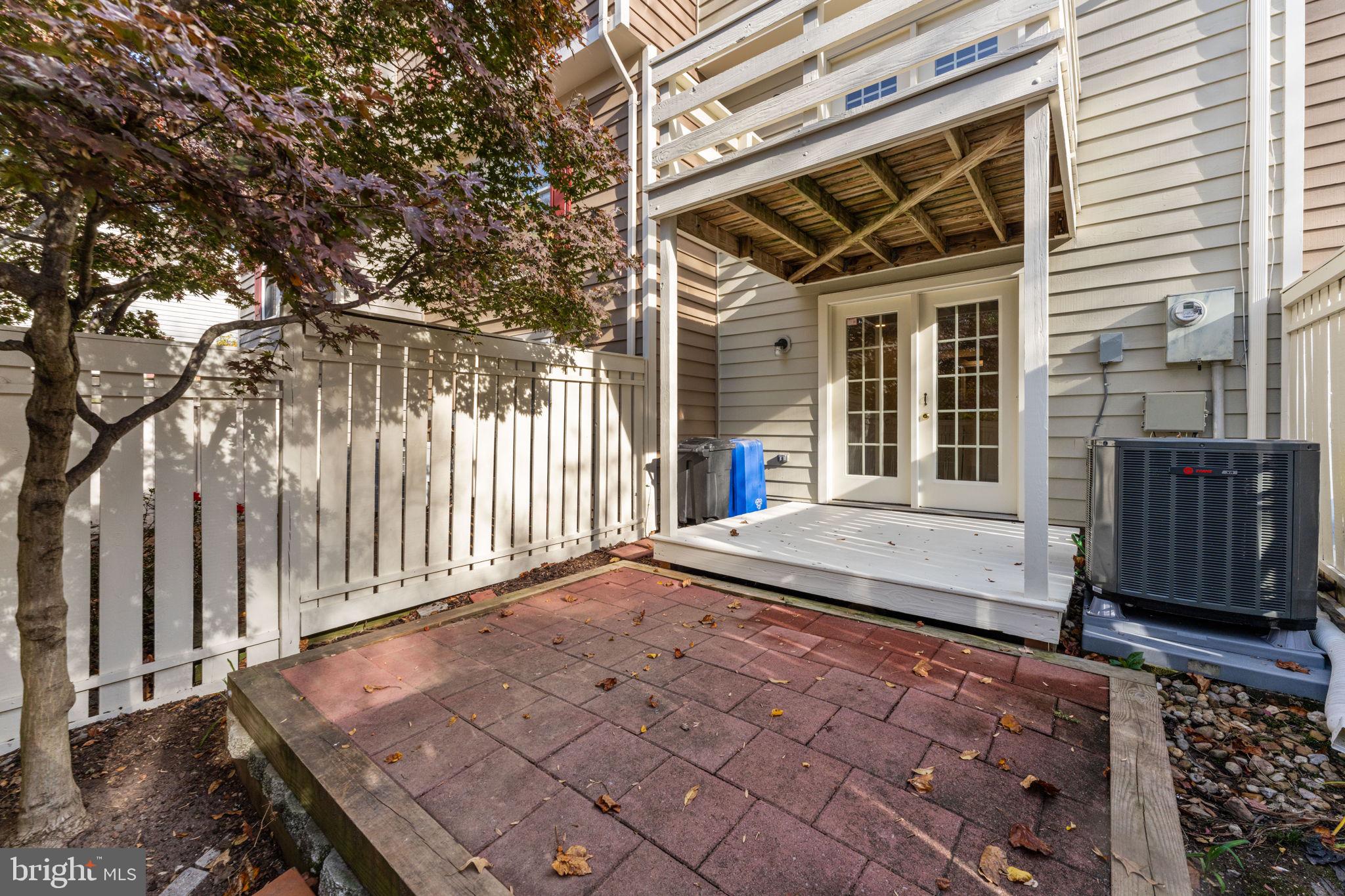 1644 Fieldthorn Drive Reston, VA 20194 - Photo 32 of 43 a view of a house with backyard and wooden fence