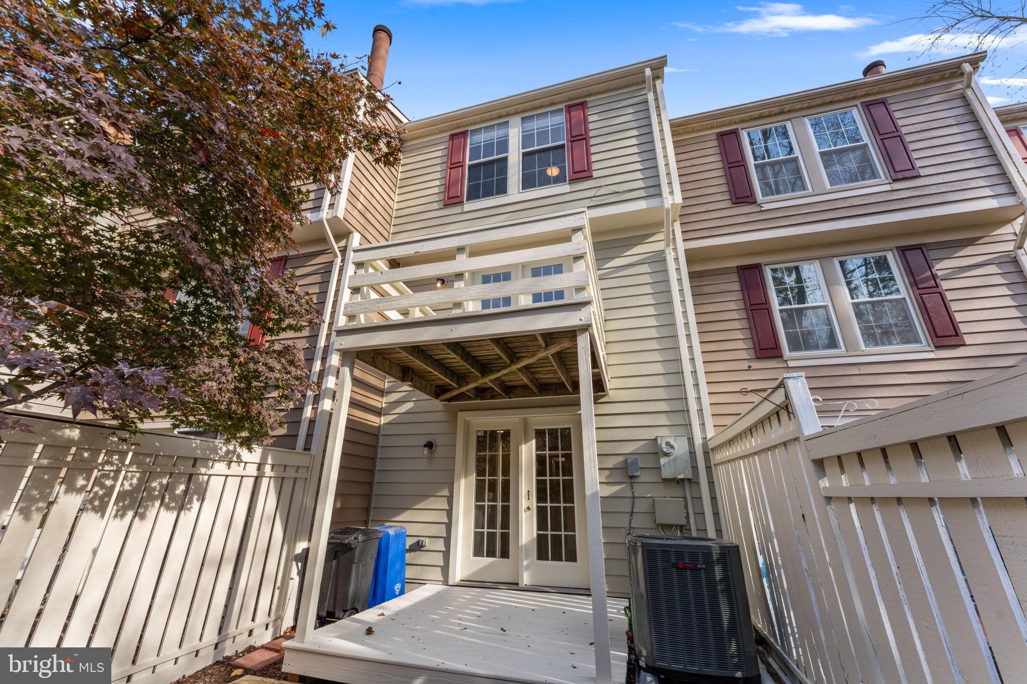 1644 Fieldthorn Drive Reston, VA 20194 - Photo 33 of 43 a front view of a building with a porch