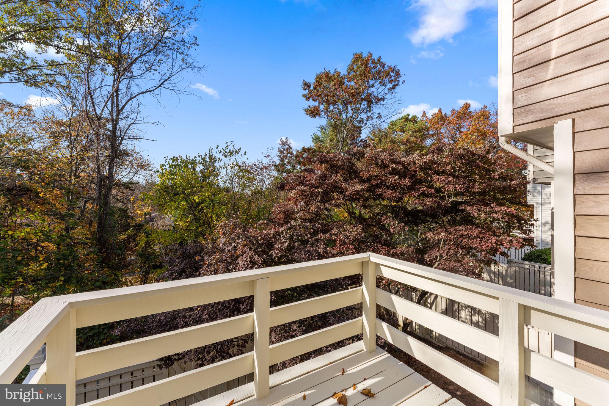 1644 Fieldthorn Drive Reston, VA 20194 - Photo 34 of 43 a view of a balcony with wooden fence and floor