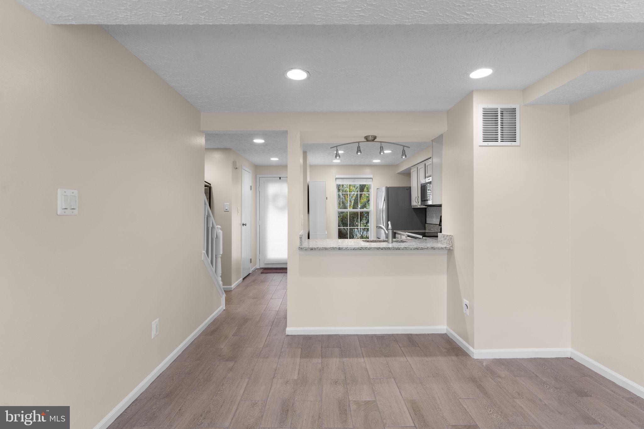 1644 Fieldthorn Drive Reston, VA 20194 - Photo 5 of 43 a view of kitchen with stainless steel appliances refrigerator oven and cabinets