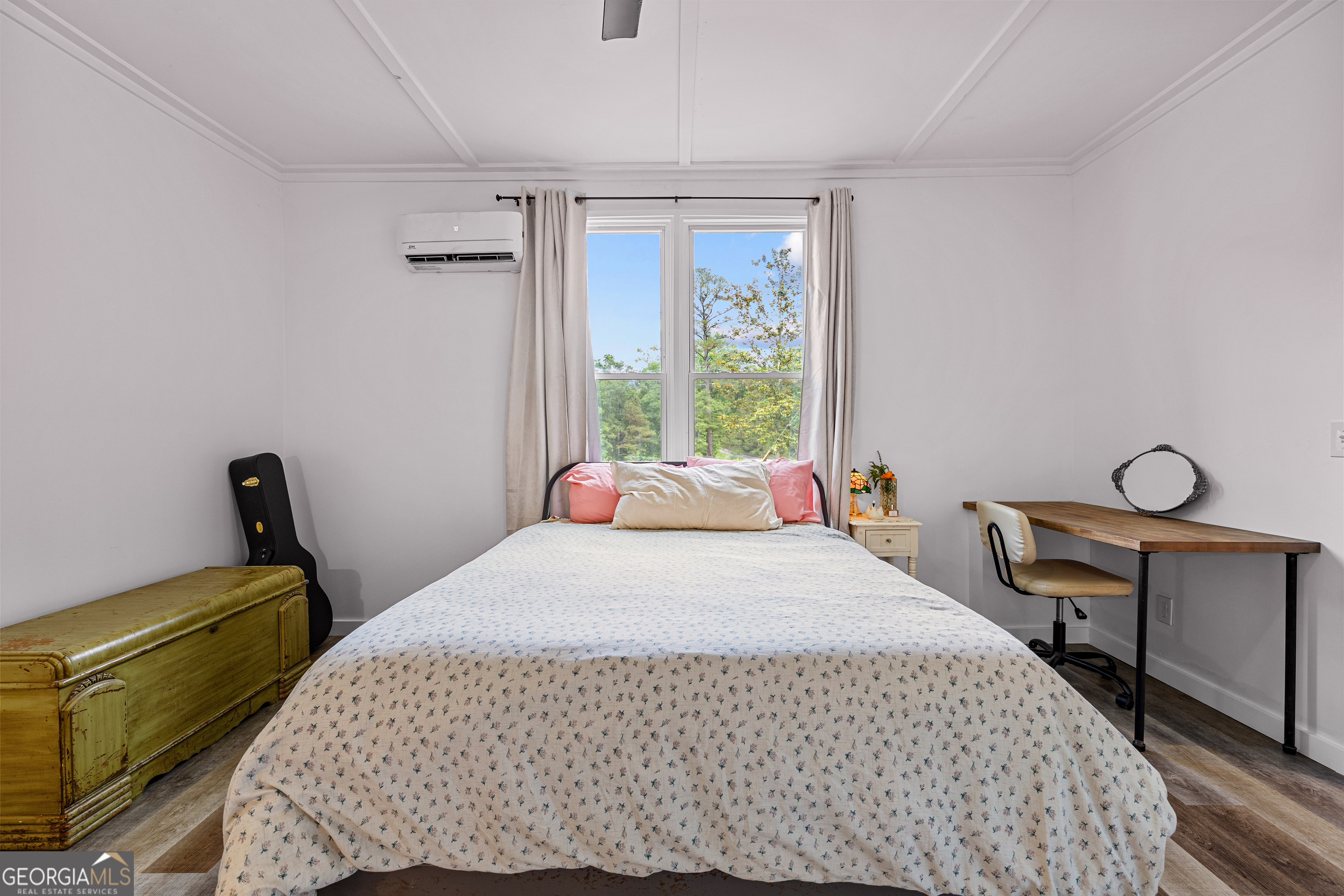 1329 Standing Rock Road Senoia, GA 30276 - Photo 41 of 77 a bedroom with a bed and a window