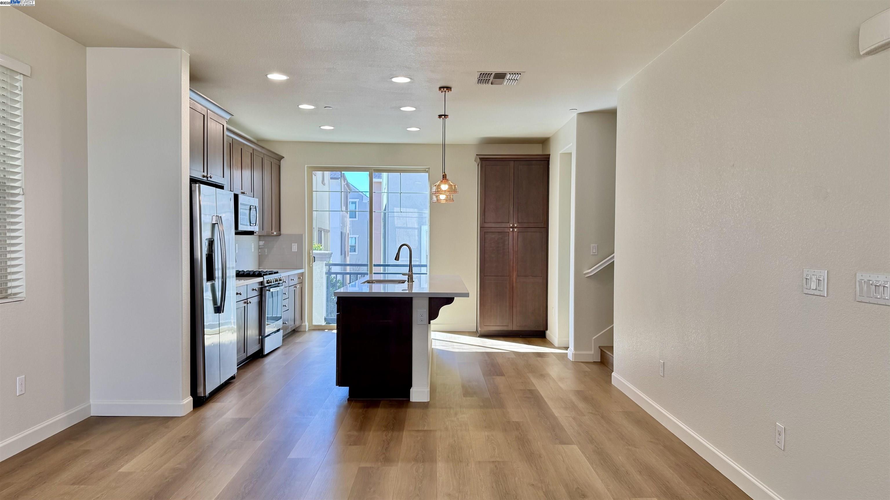 2906 Worthing Common Livermore, CA 94550 - Photo 14 of 31 a view of kitchen with sink and refrigerator