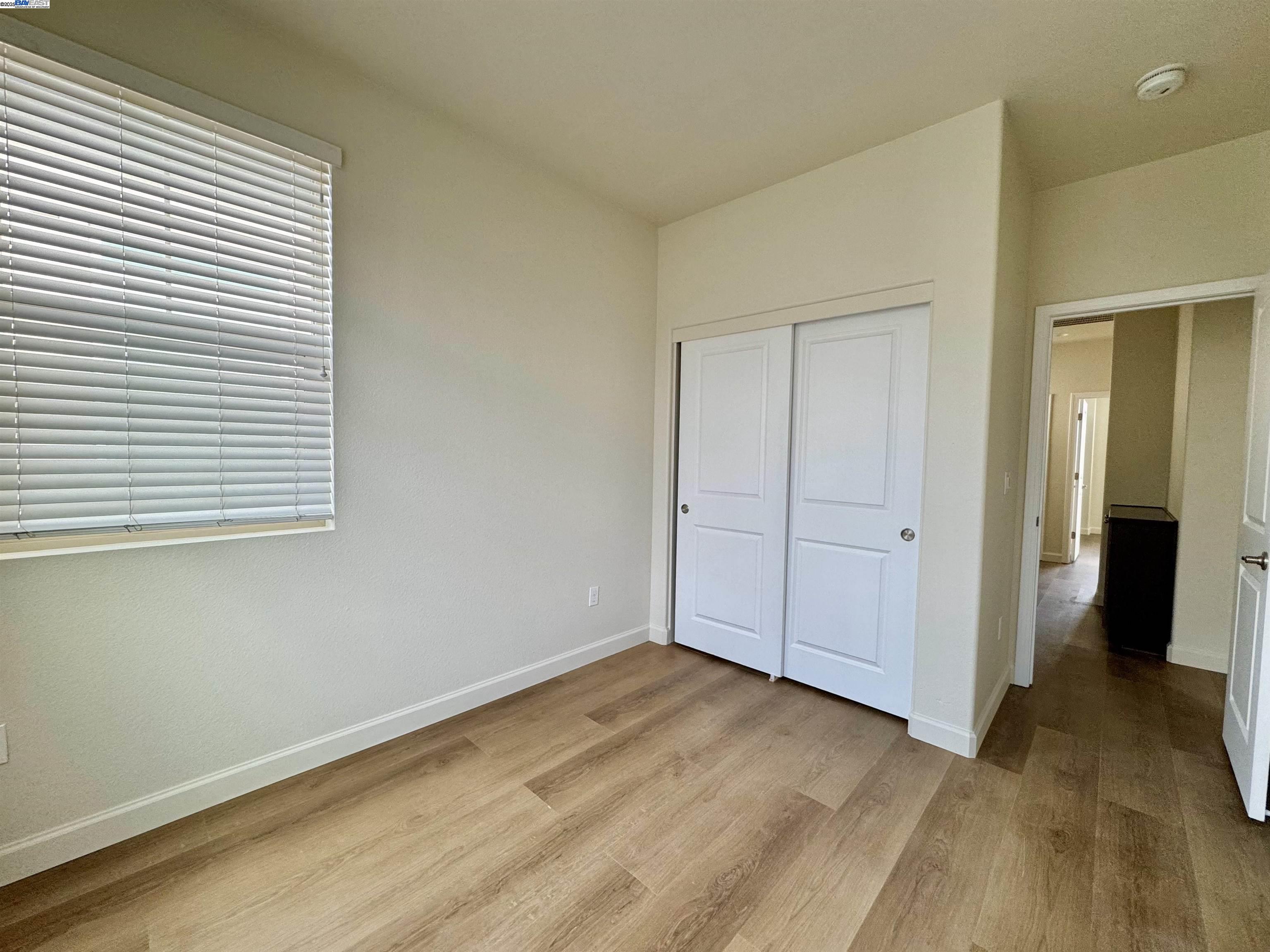 2906 Worthing Common Livermore, CA 94550 - Photo 25 of 31 an empty room with wooden floor