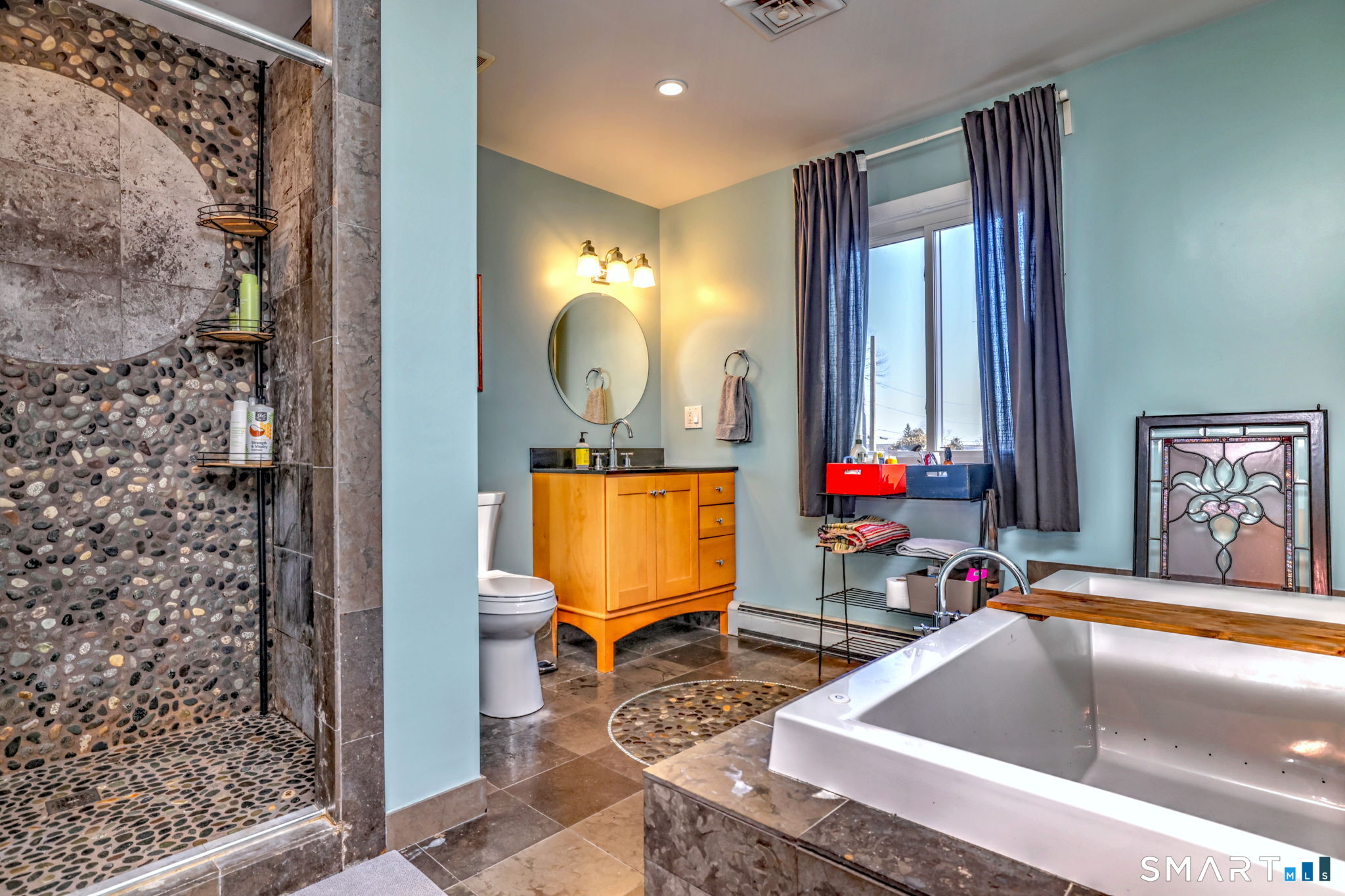 67 Hauser Street Milford, CT 06460 - Photo 25 of 40 a view of living room and bathroom