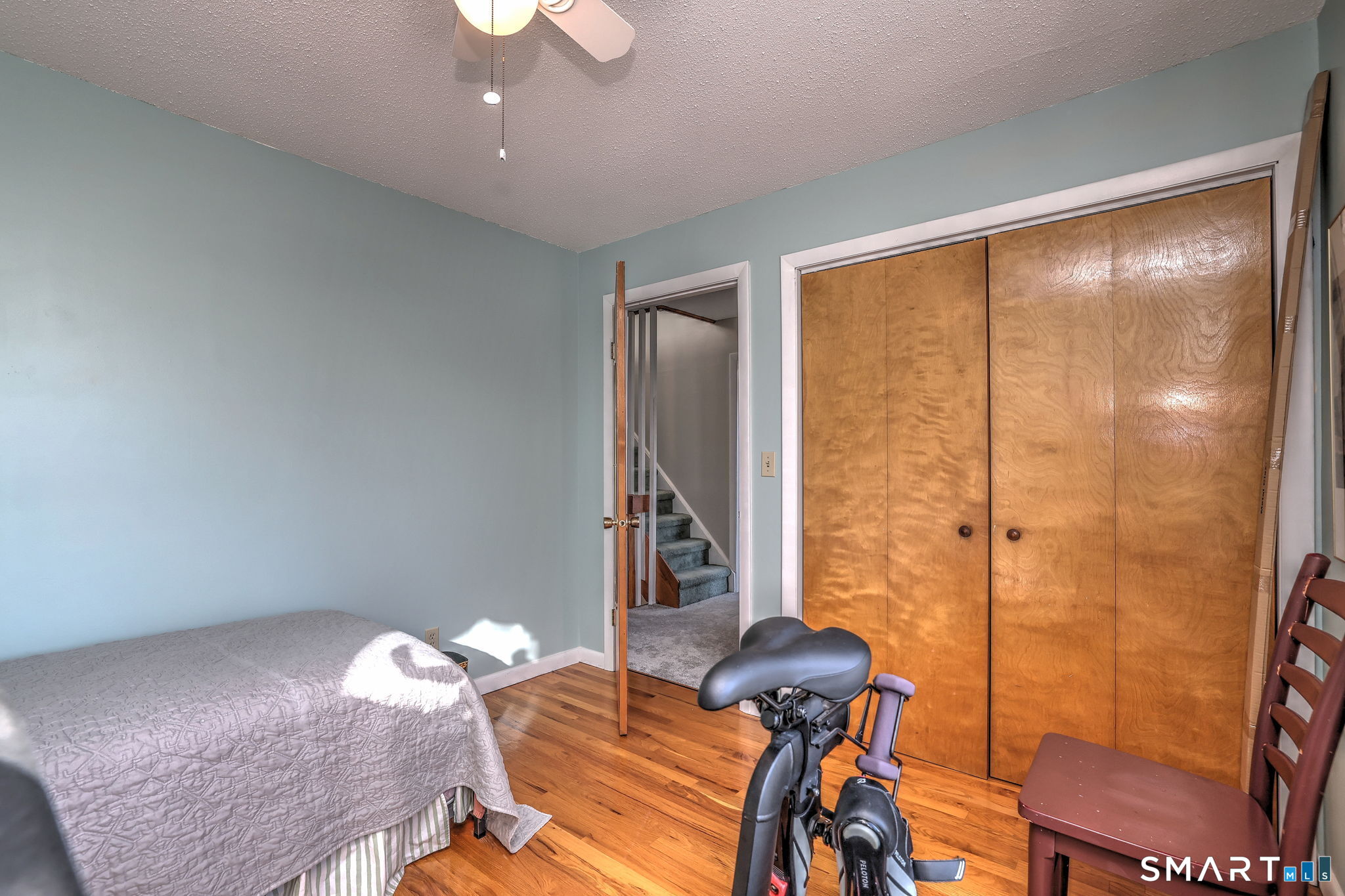 67 Hauser Street Milford, CT 06460 - Photo 28 of 40 a view of a room with furniture and wooden floor