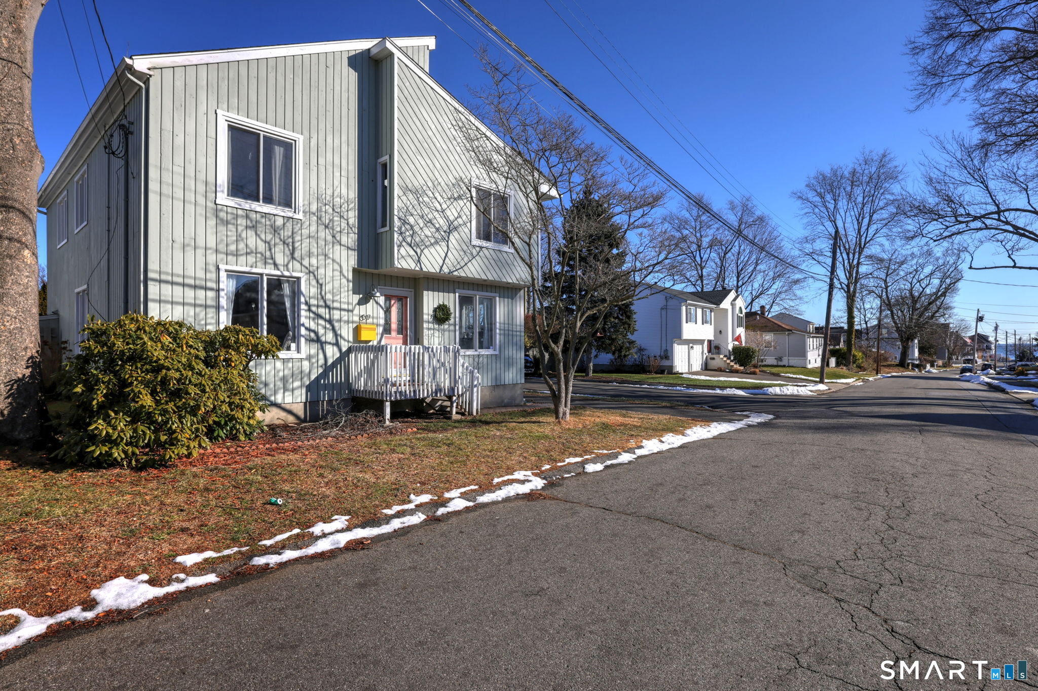 67 Hauser Street Milford, CT 06460 - Photo 3 of 40 a view of road with card