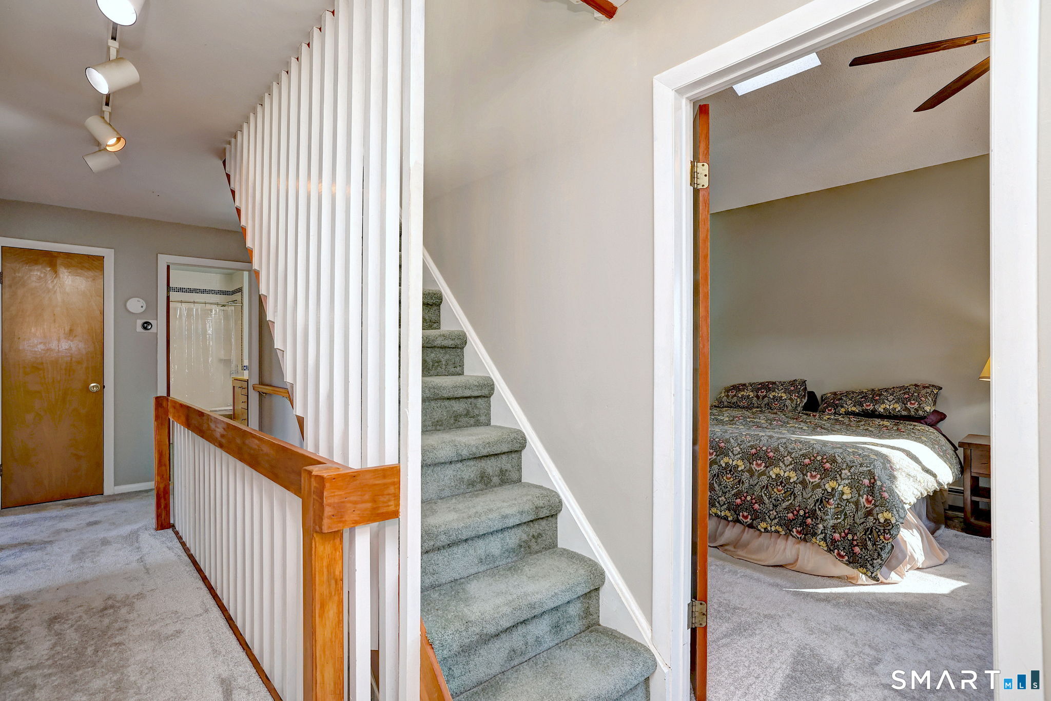 67 Hauser Street Milford, CT 06460 - Photo 34 of 40 a view of a livingroom from a hallway