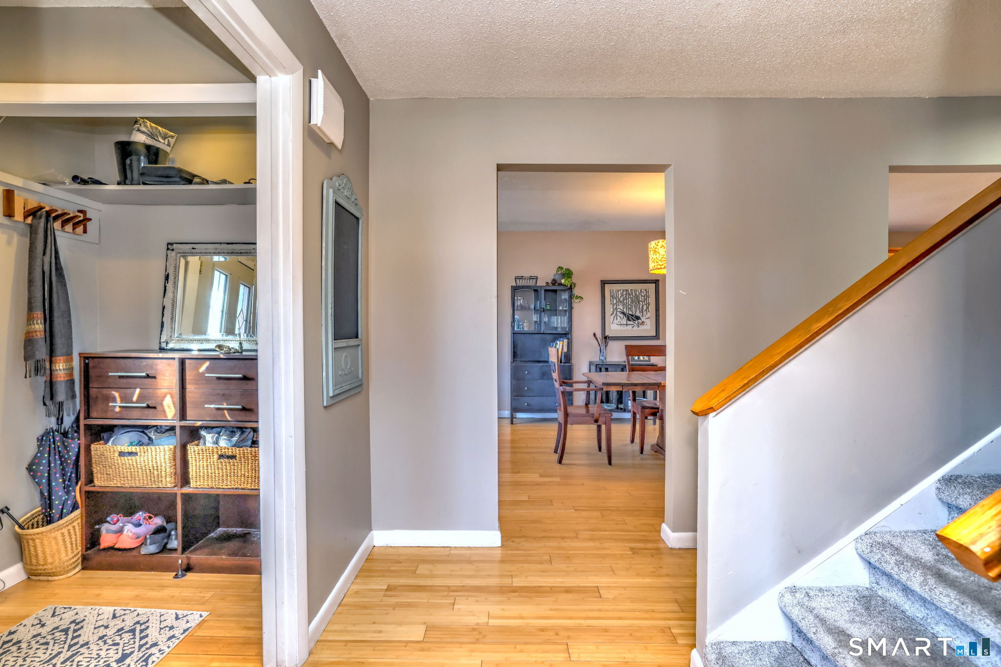 67 Hauser Street Milford, CT 06460 - Photo 10 of 40 a view of a hallway with wooden floor and windows