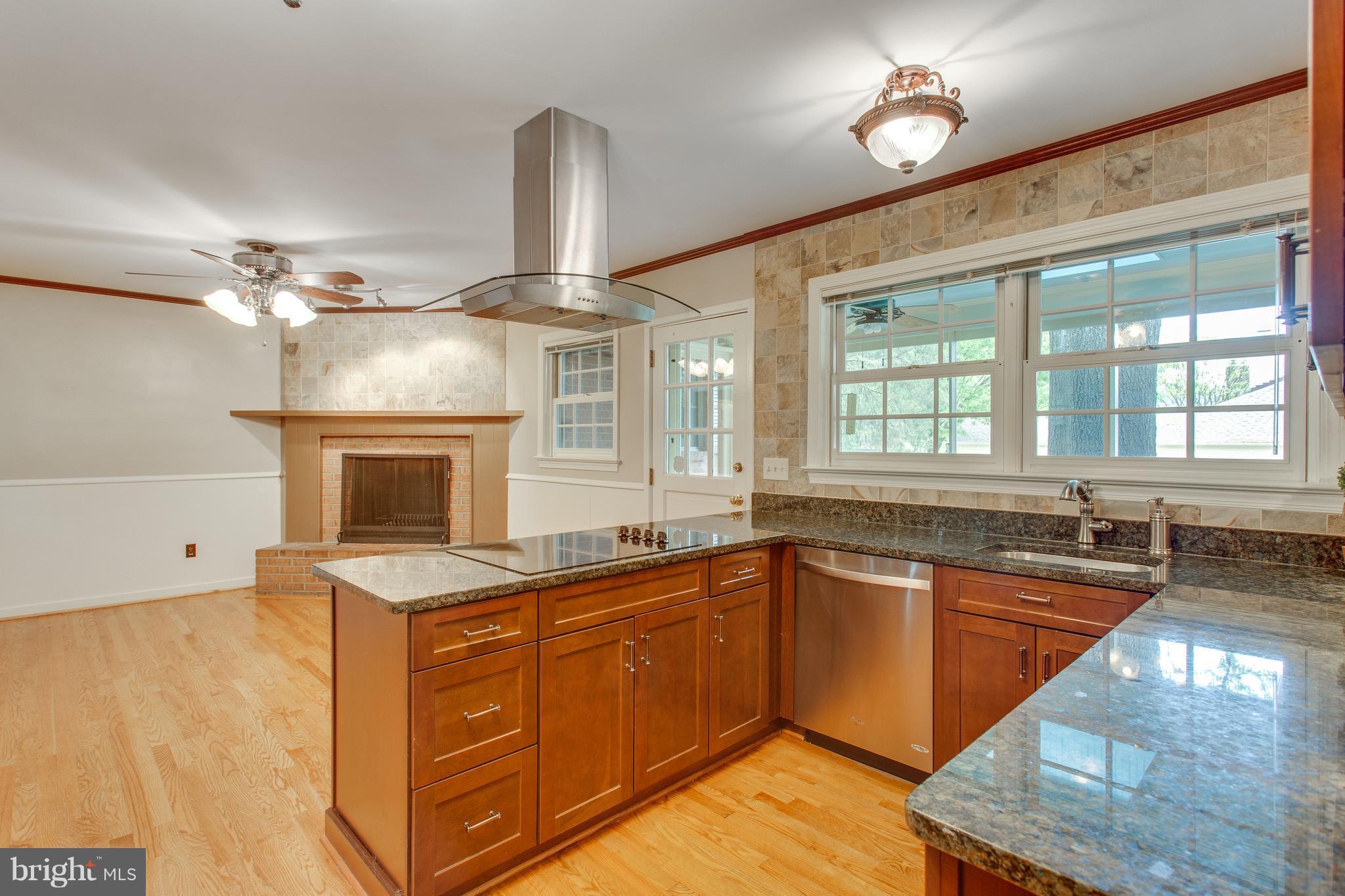 1004 Vassar Road Alexandria, VA 22314 - Photo 12 of 29 Eat-in Kitchen/Family Room w/Wd Burning Fireplace
