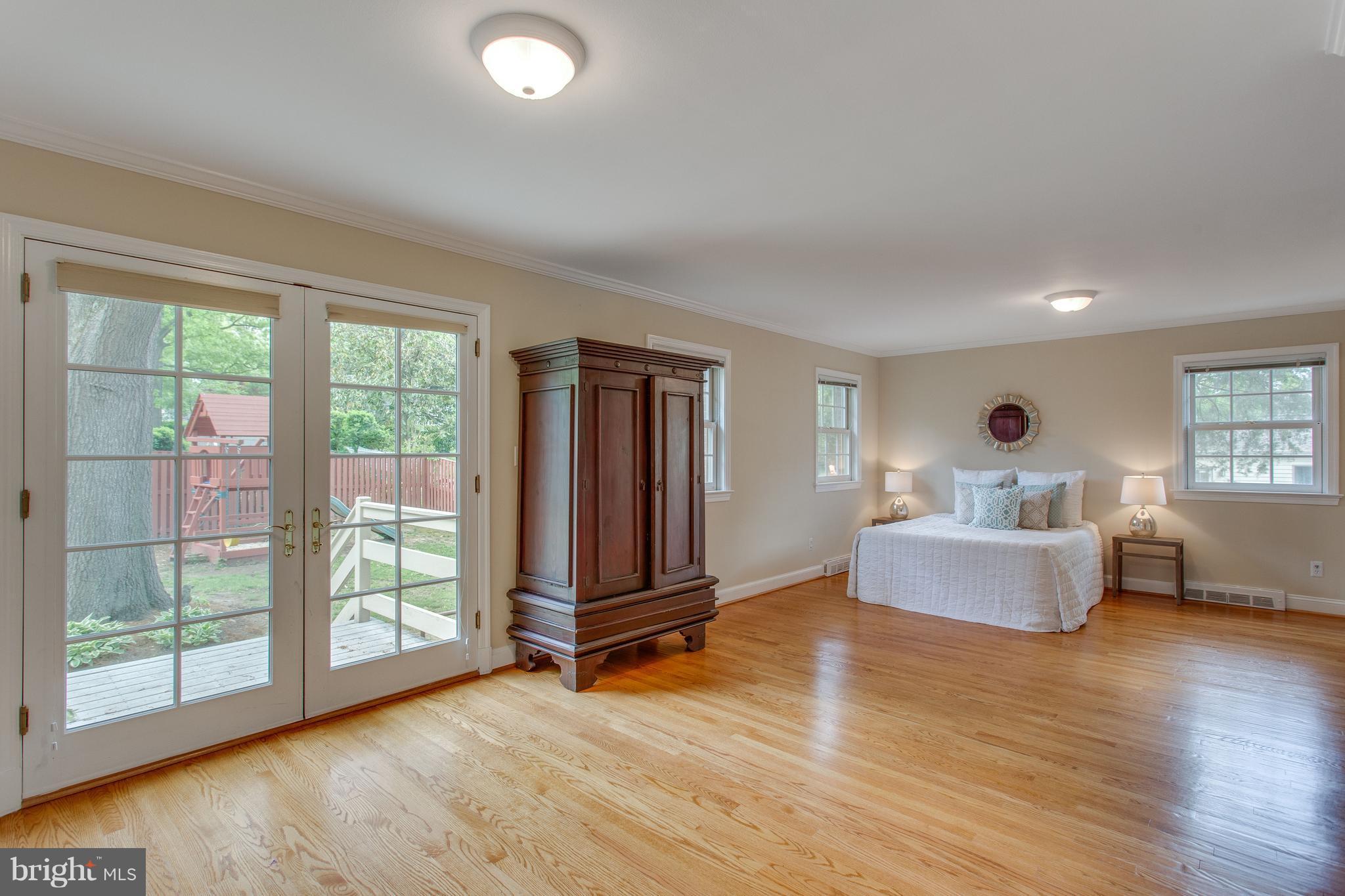 1004 Vassar Road Alexandria, VA 22314 - Photo 13 of 29 Oversized Master Bedroom Leading to Yard