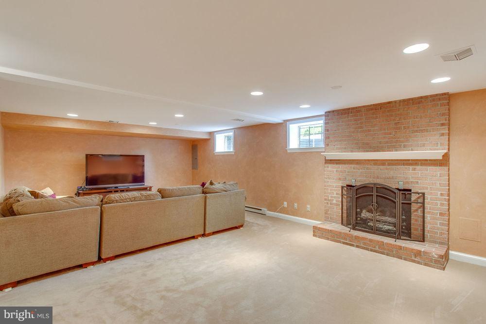 1004 Vassar Road Alexandria, VA 22314 - Photo 19 of 29 Rec Room with Gas Fireplace