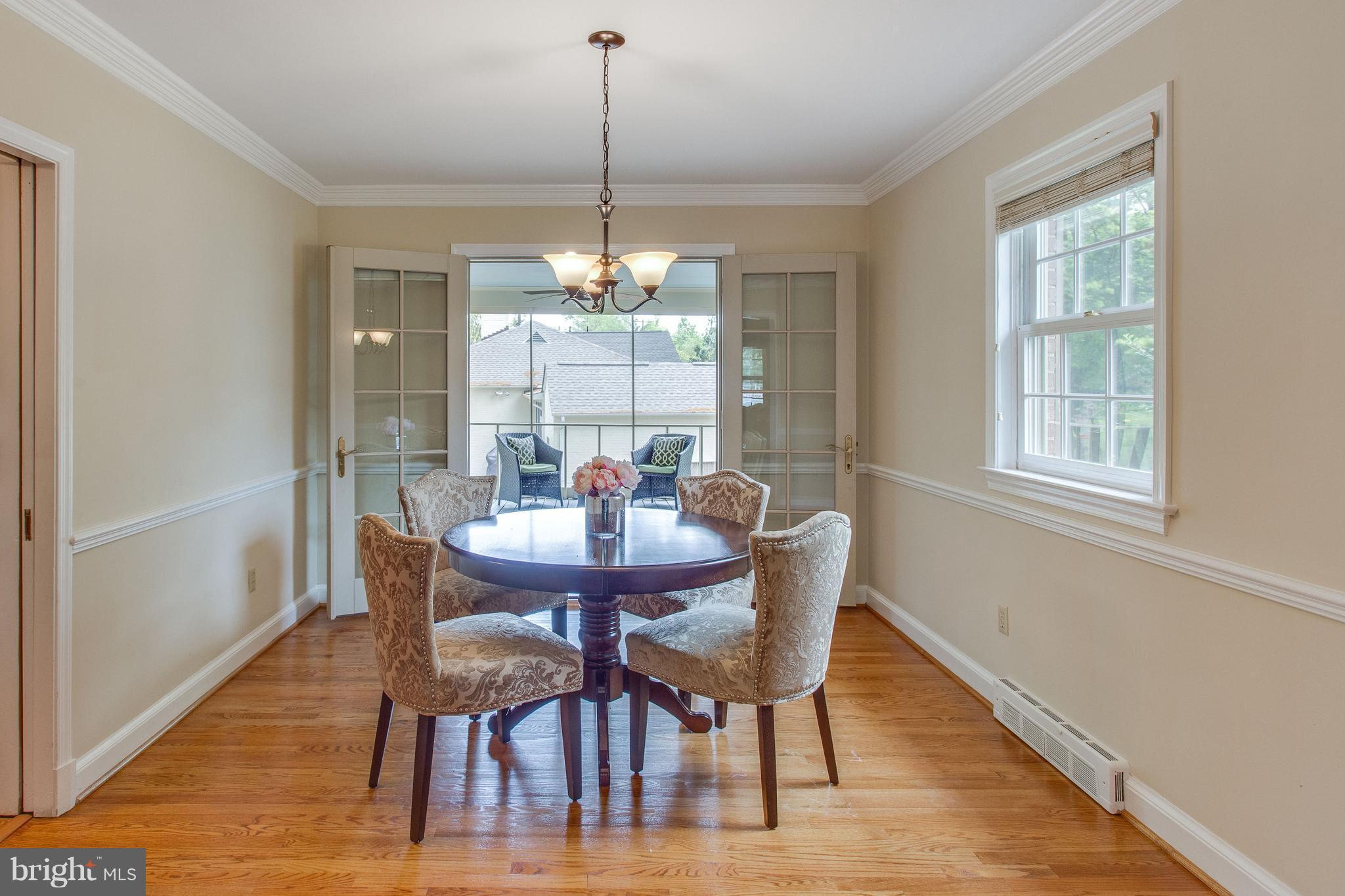 1004 Vassar Road Alexandria, VA 22314 - Photo 8 of 29 Dining Room Opens to Screened Porch