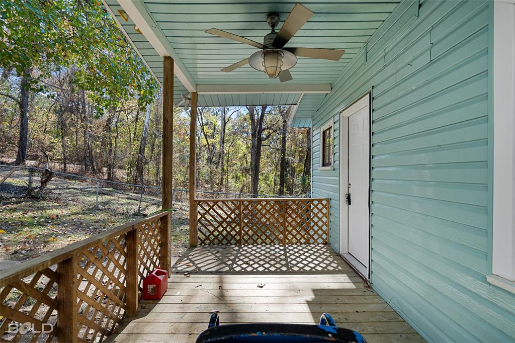 333 Canal Street Ringgold, LA 71068 - Photo 2 of 33 a view of a porch with wooden floor