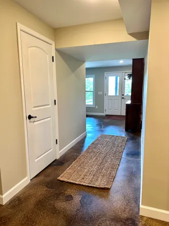 a view of entryway with wooden floor