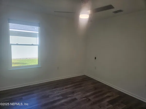 a front view of a house with yard