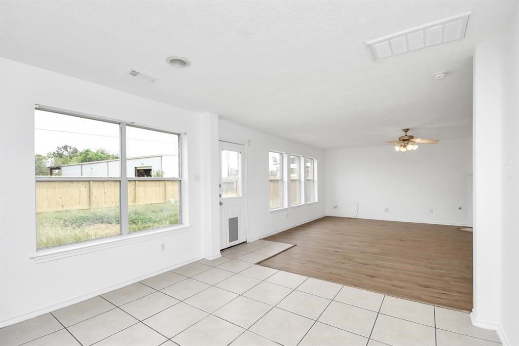 21818 Dimmett Way Spring, TX 77388 - Photo 14 of 35 a view of an empty room with a window