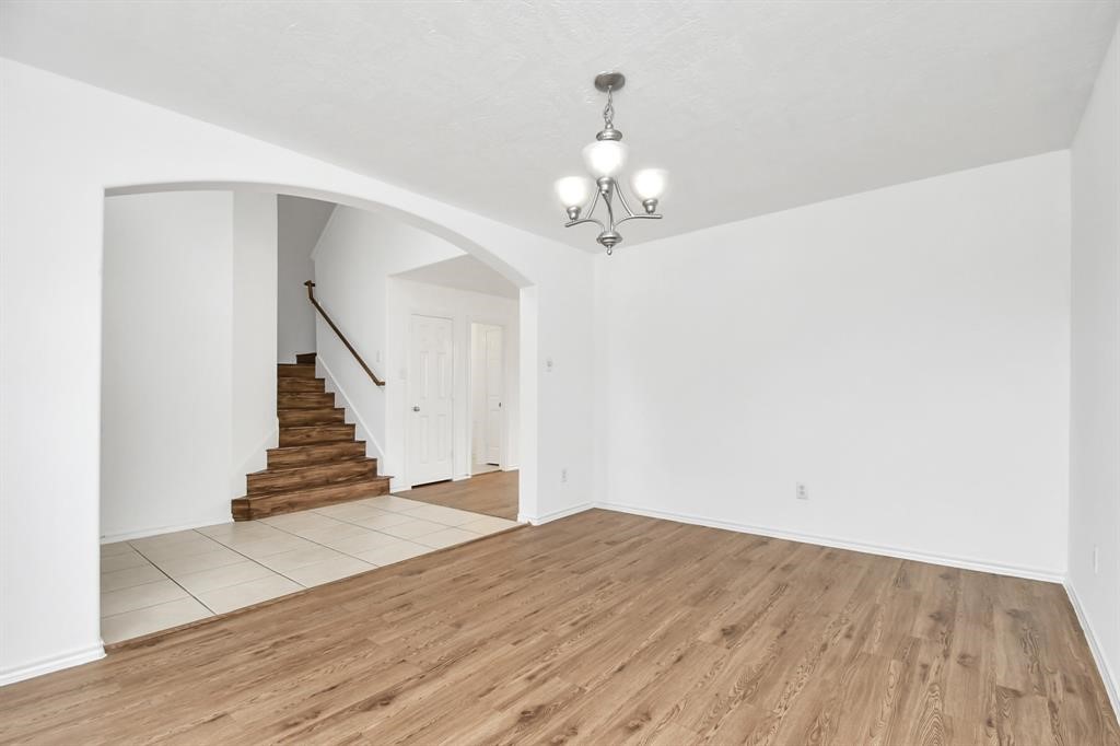 21818 Dimmett Way Spring, TX 77388 - Photo 15 of 35 a view of entryway with wooden floor