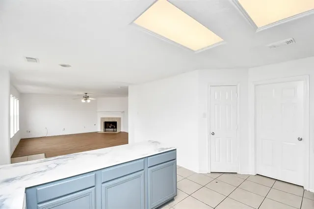 a view of a kitchen with a sink and dishwasher