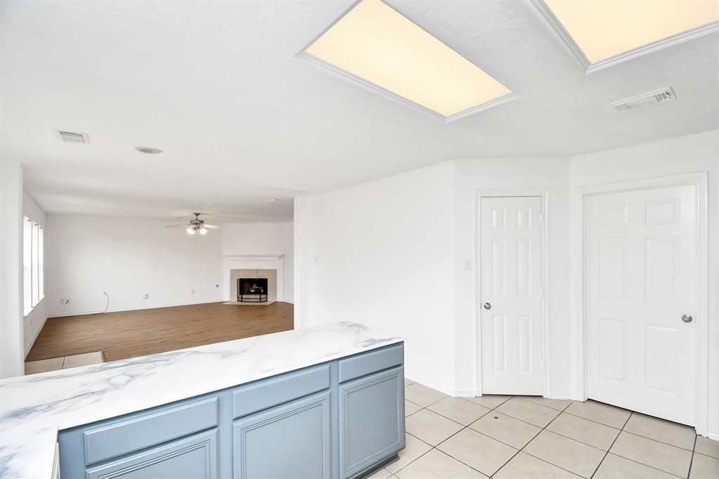 21818 Dimmett Way Spring, TX 77388 - Photo 10 of 35 a view of a kitchen with a sink and dishwasher