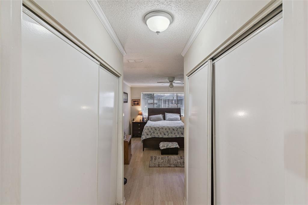 10943 Southwest 86th Court Ocala, FL 34481 - Photo 23 of 35 a room with furniture and a chandelier