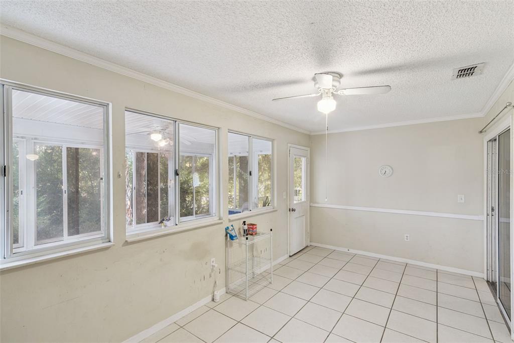 10943 Southwest 86th Court Ocala, FL 34481 - Photo 31 of 35 a view of an empty room with a window
