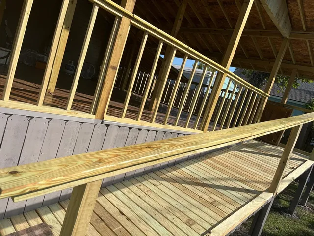 a view of a backyard with a small cabin and a chair