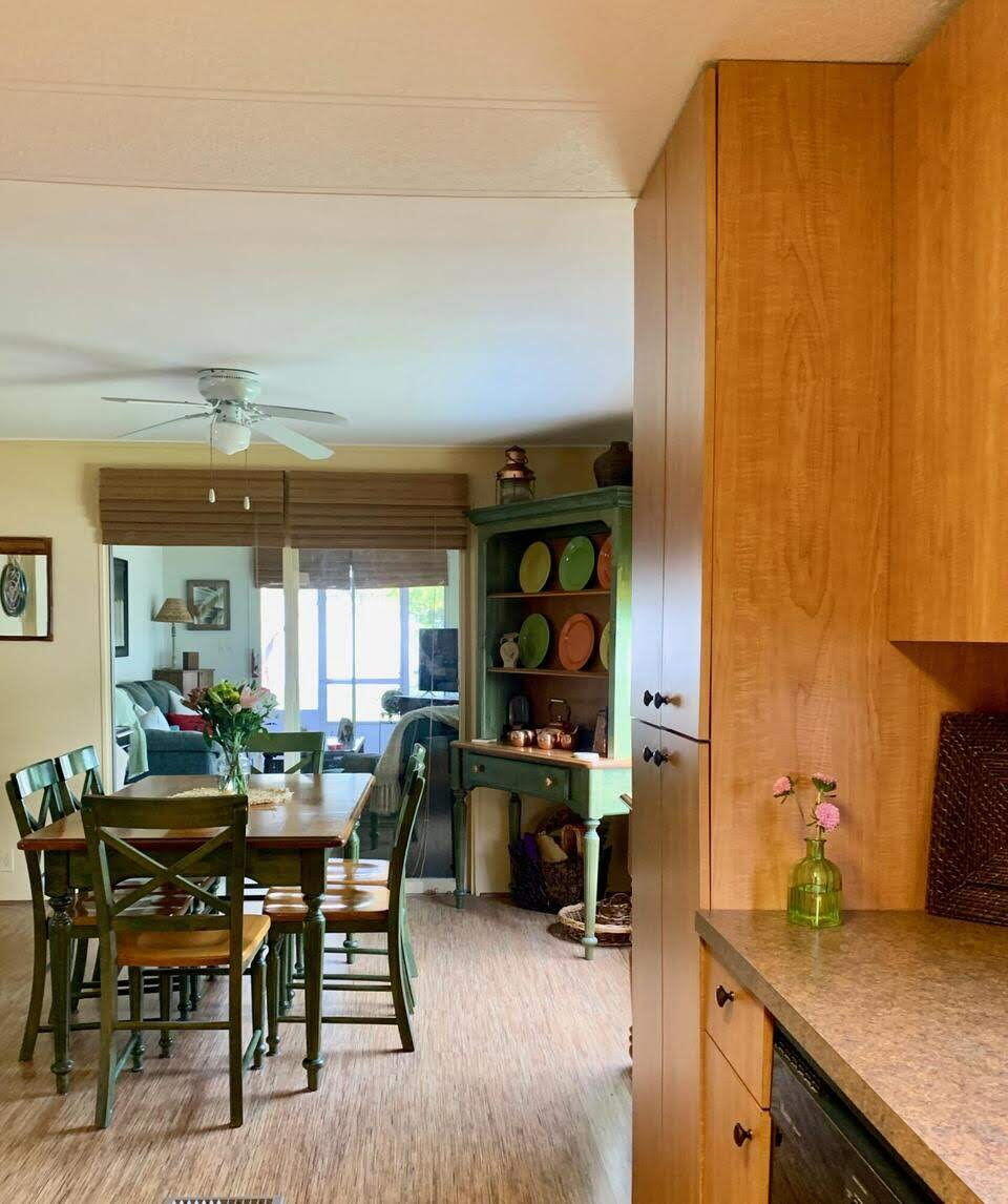 12 Orinco Road Fort Pierce, FL 34952 - Photo 17 of 50 a view of a dining room with furniture and a chandelier