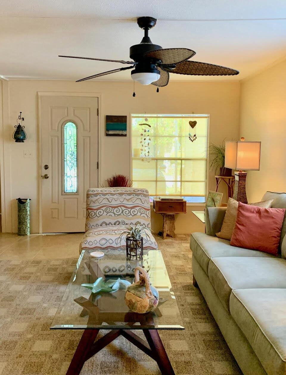 12 Orinco Road Fort Pierce, FL 34952 - Photo 8 of 50 a living room with furniture and a large window