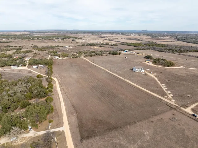 an aerial view of beach and ocean